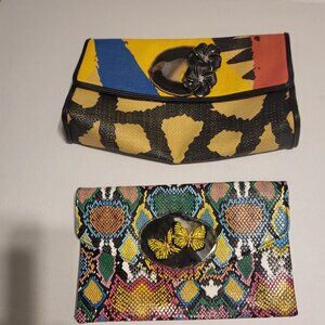 Two decorated clutch purses